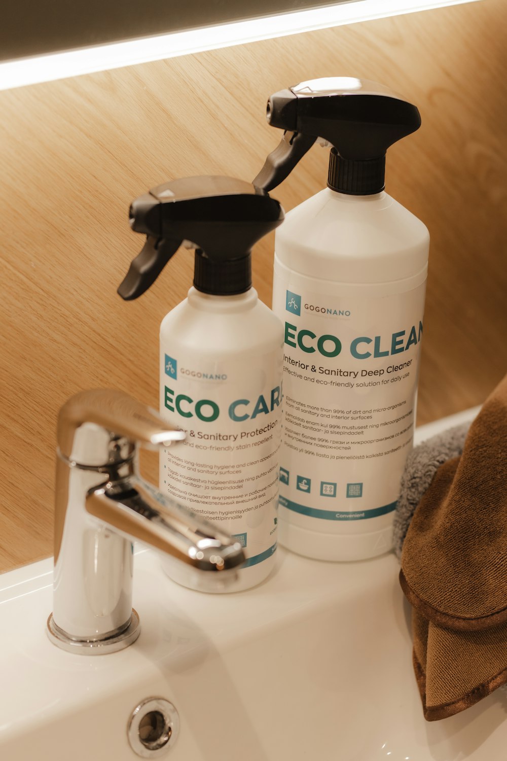 a close up of a bathroom sink with a soap dispenser