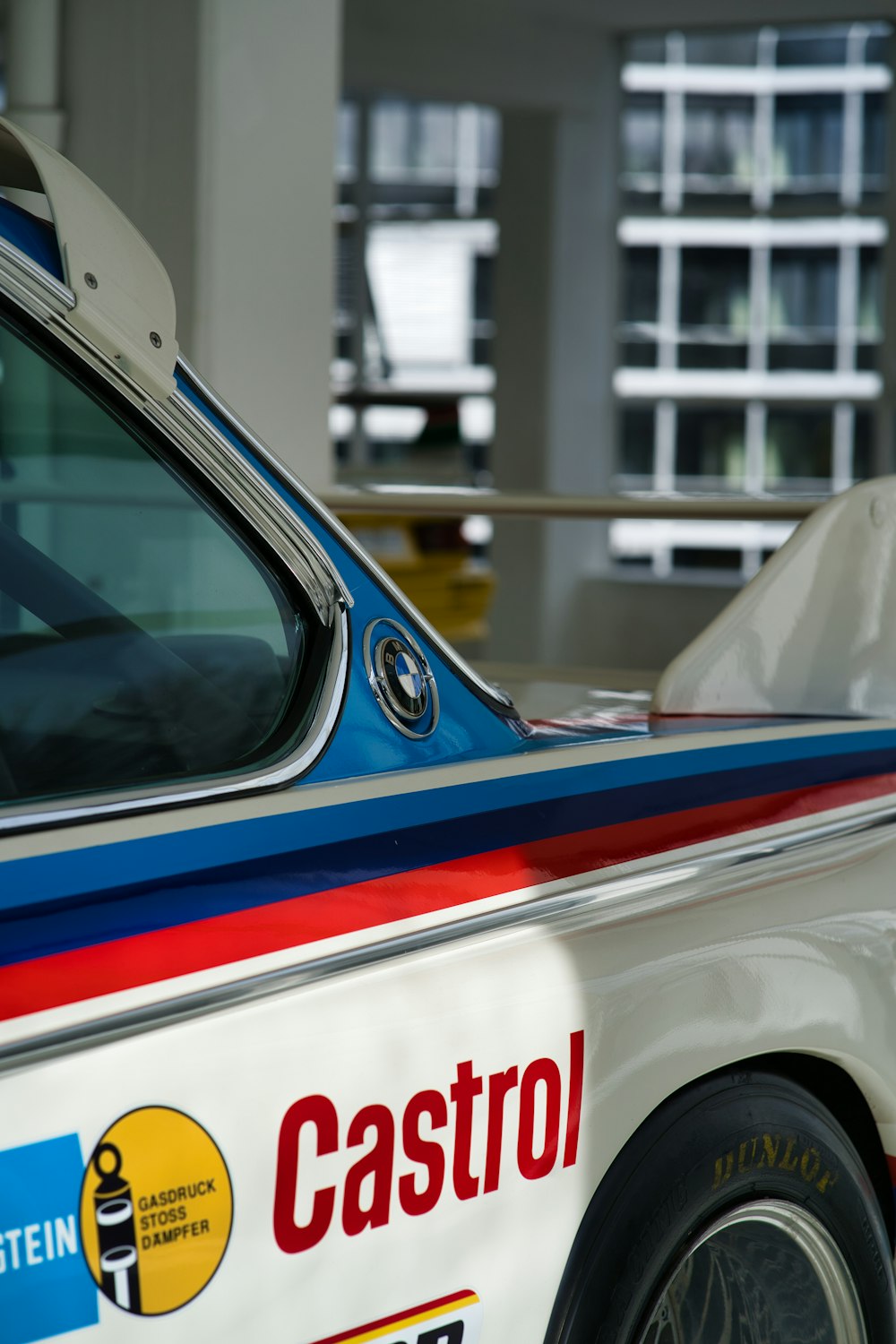 a close up of a car parked in a parking garage