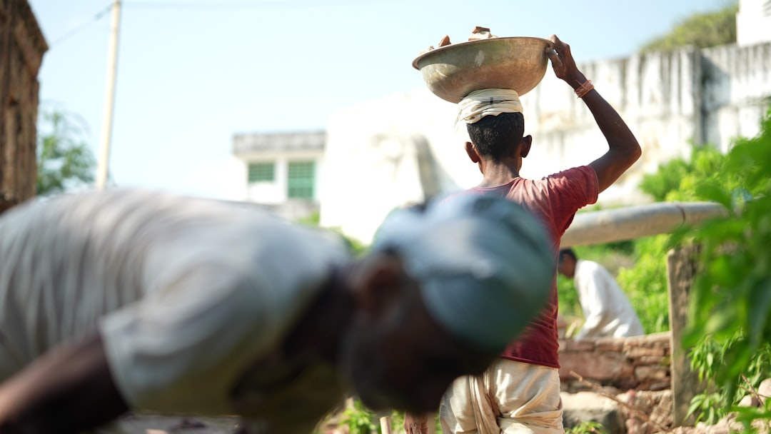 A poor Indian labor working at construction site.