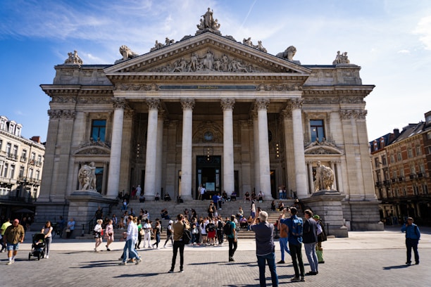 a group of people standing in front of a building