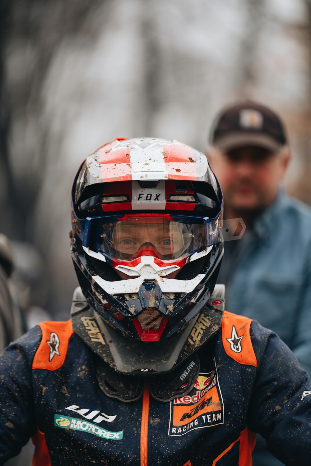 a young boy wearing a helmet and goggles