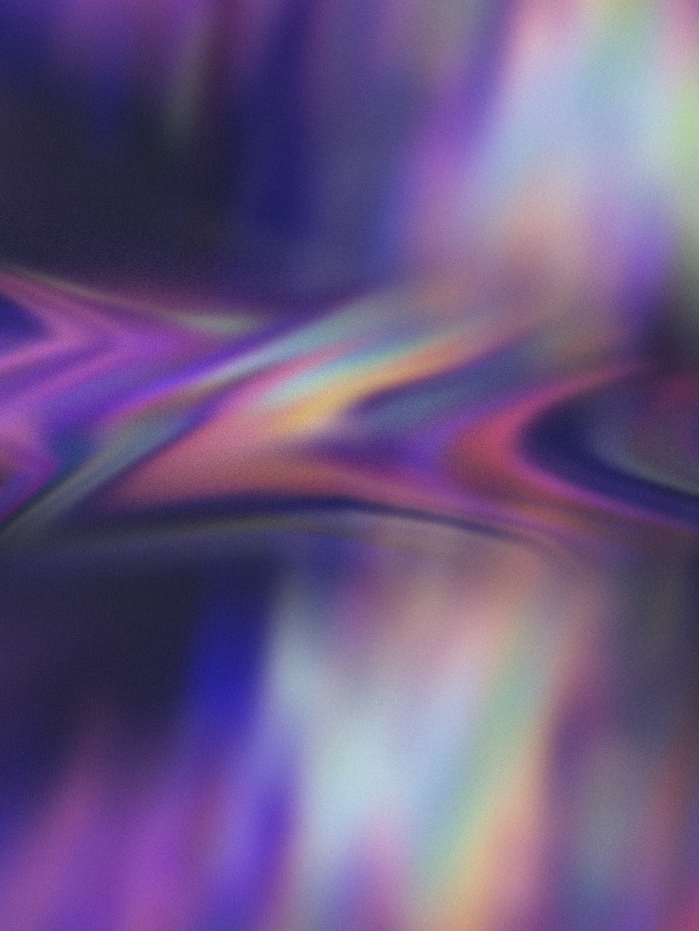 a blurry image of a purple and blue background