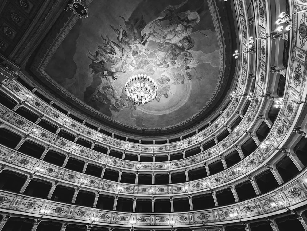 a black and white photo of a ceiling in a building