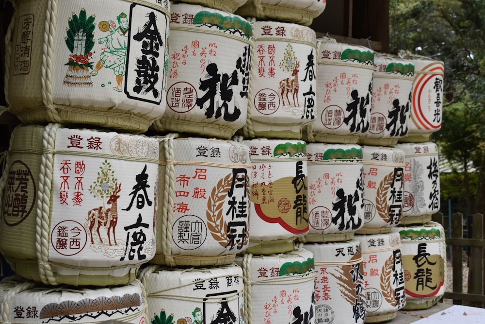a large stack of bags with asian writing on them