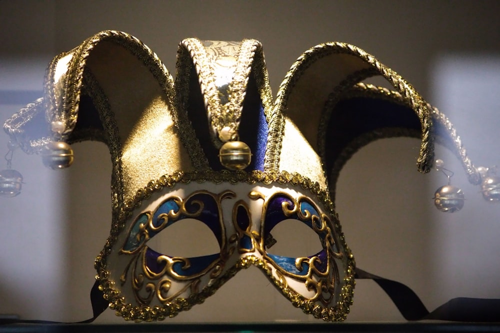 a masquerade mask on display in a museum