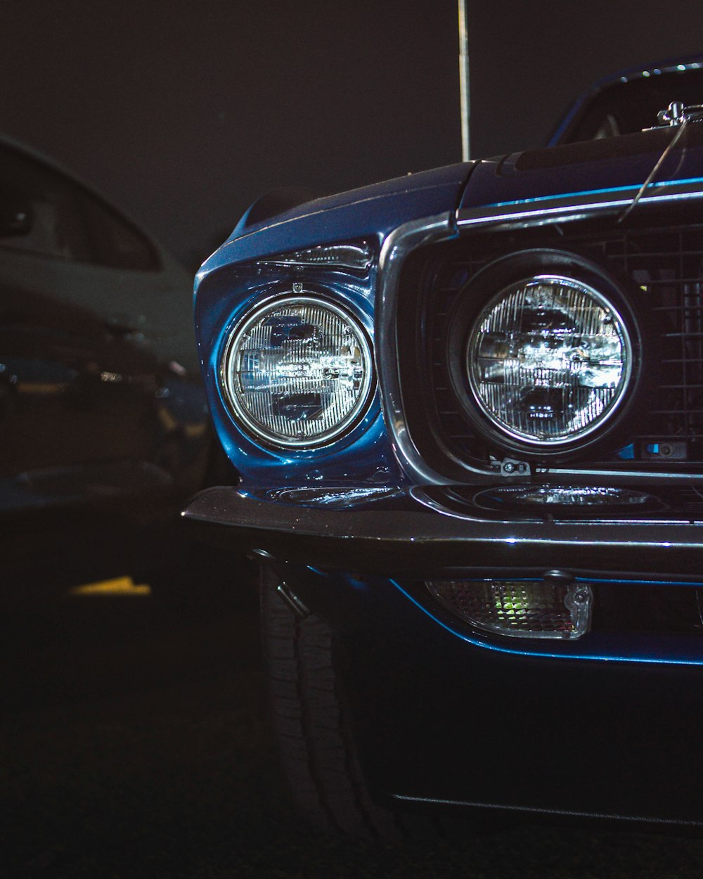 a close up of the headlights of a car