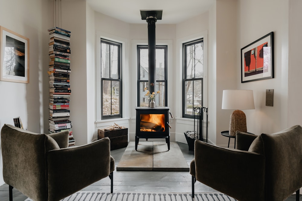 a living room filled with furniture and a fire place