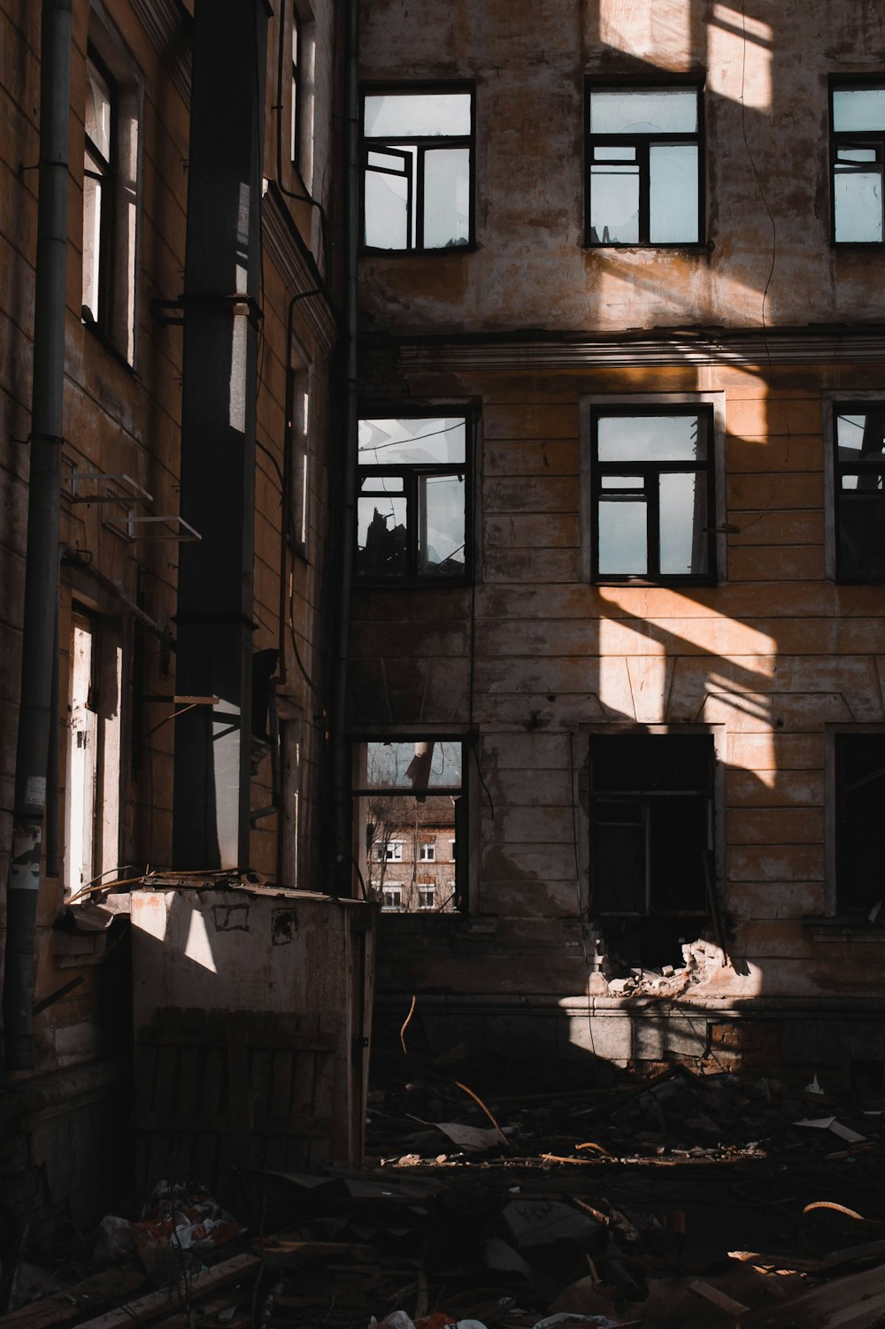 a run down building with lots of windows