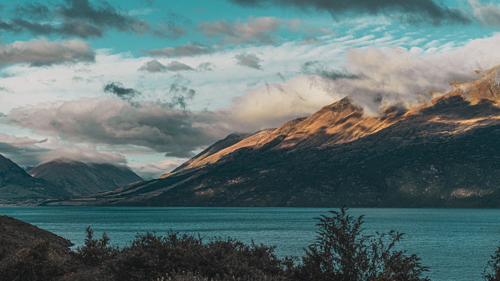 a large body of water surrounded by mountains