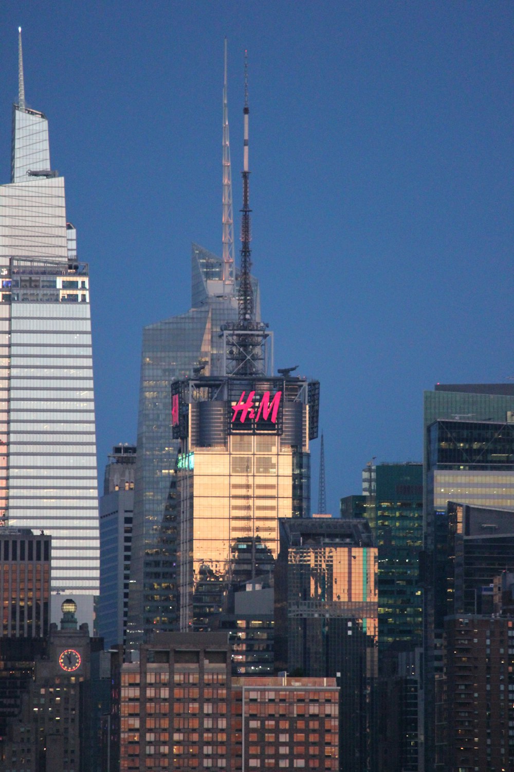 a view of a city skyline with tall buildings