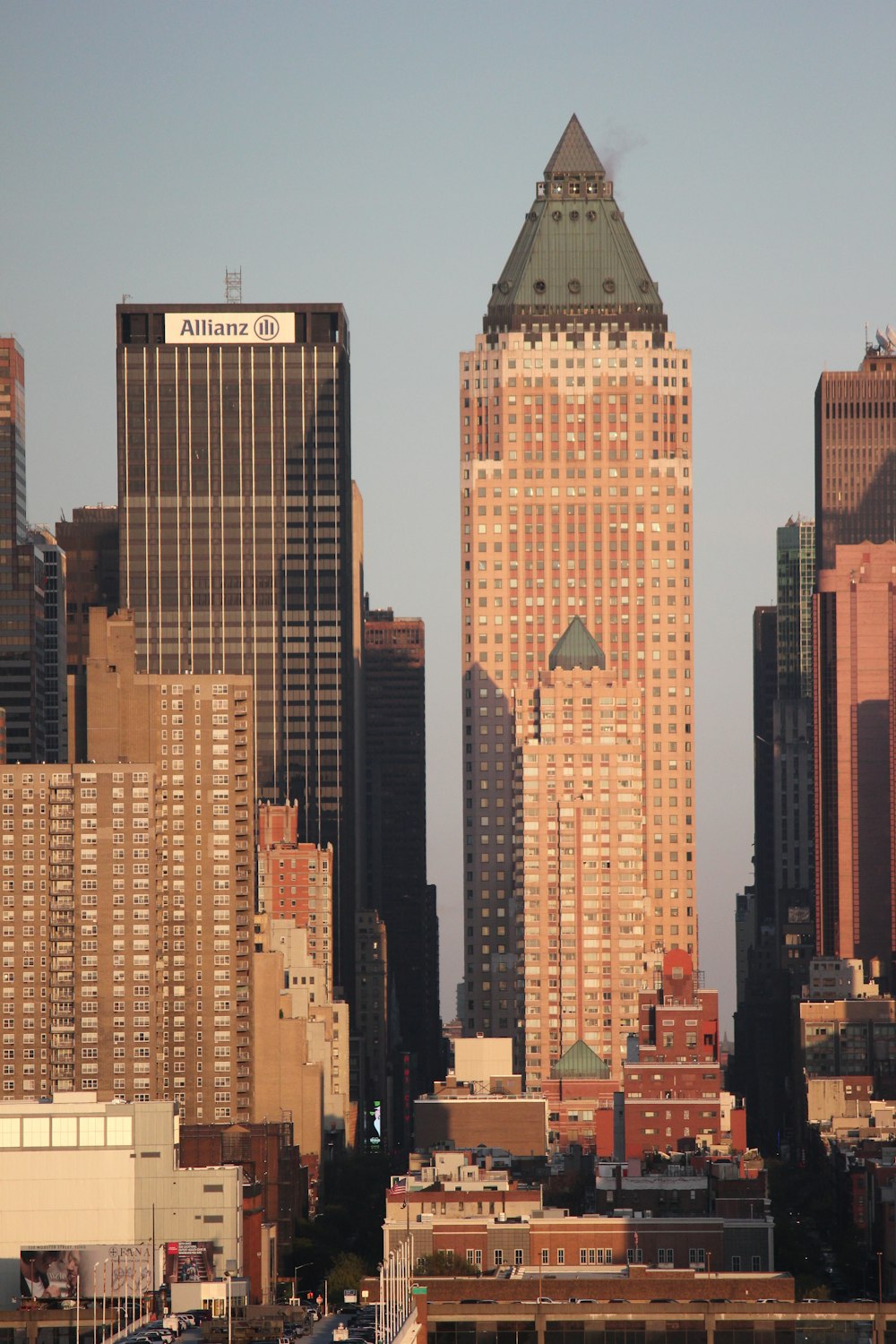 a view of a city with tall buildings