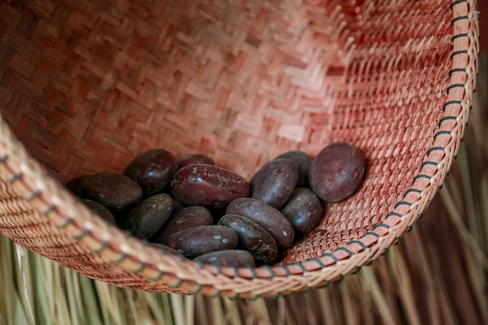 a basket filled with nuts sitting on top of a table