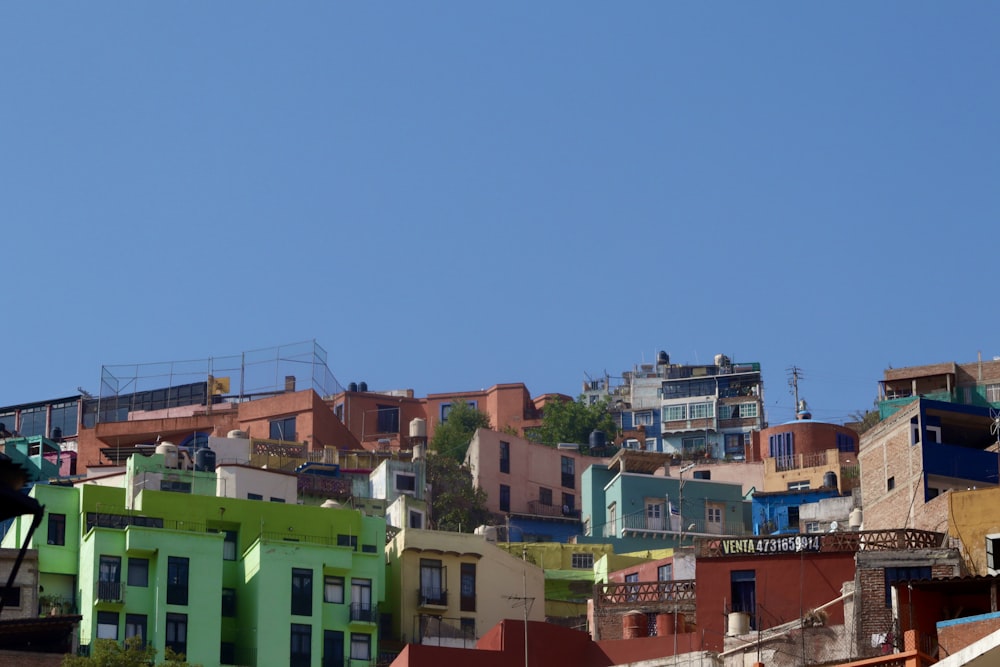 a view of a city with lots of colorful buildings