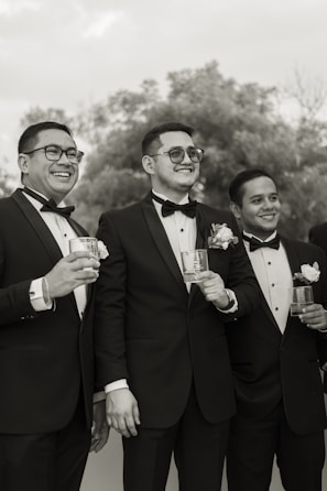 a group of men standing next to each other