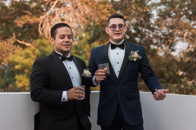 a couple of men standing next to each other