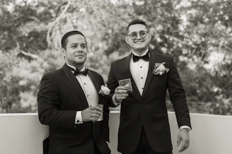 a couple of men standing next to each other