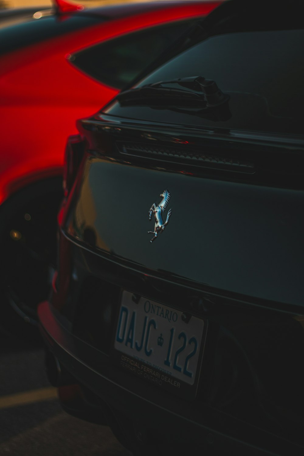 a close up of two cars parked next to each other