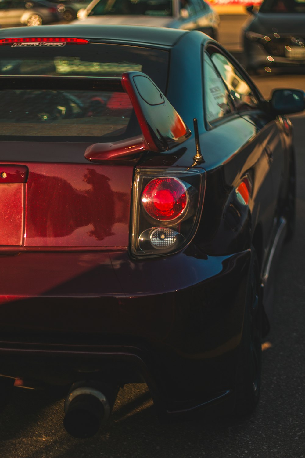 a close up of a car parked on the side of the road