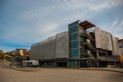 a large building with a staircase going up the side of it