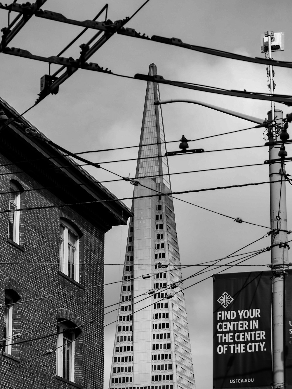 a black and white photo of a tall building