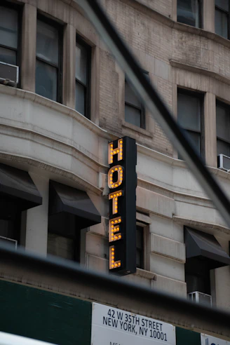 a hotel sign on the side of a building