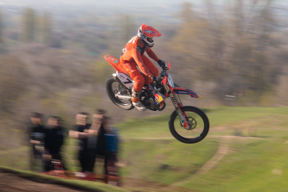 a person on a dirt bike in the air