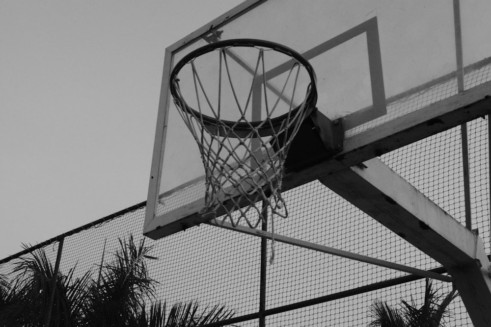 a black and white photo of a basketball hoop