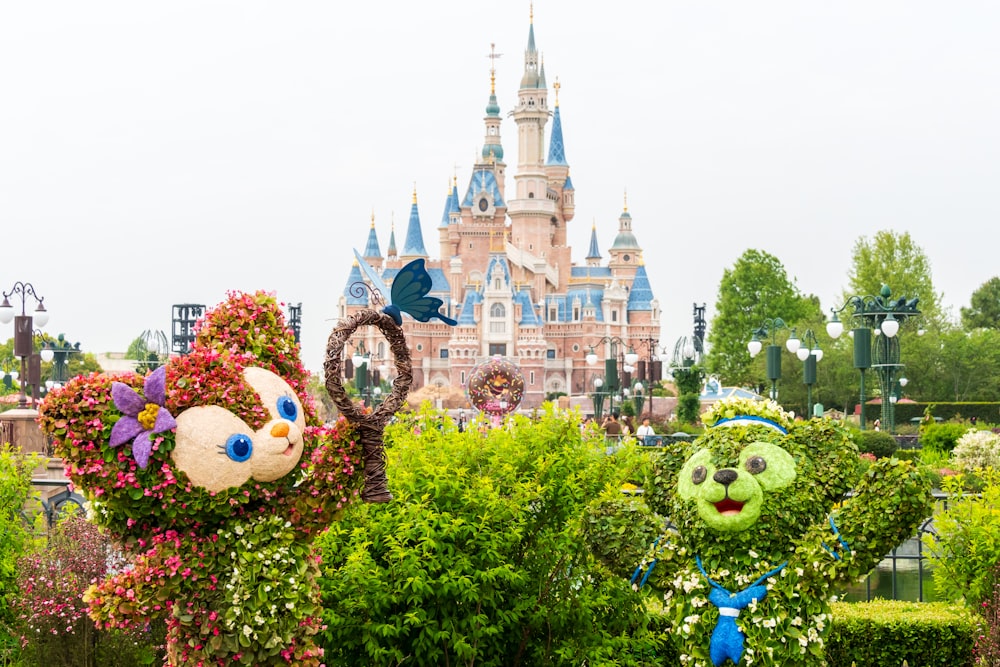 a couple of plants that are in front of a castle