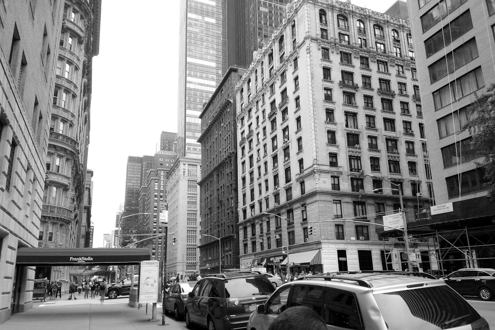 a city street filled with lots of tall buildings