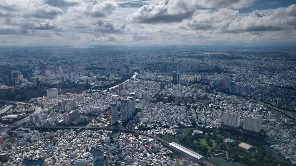 an aerial view of a city with a river running through it