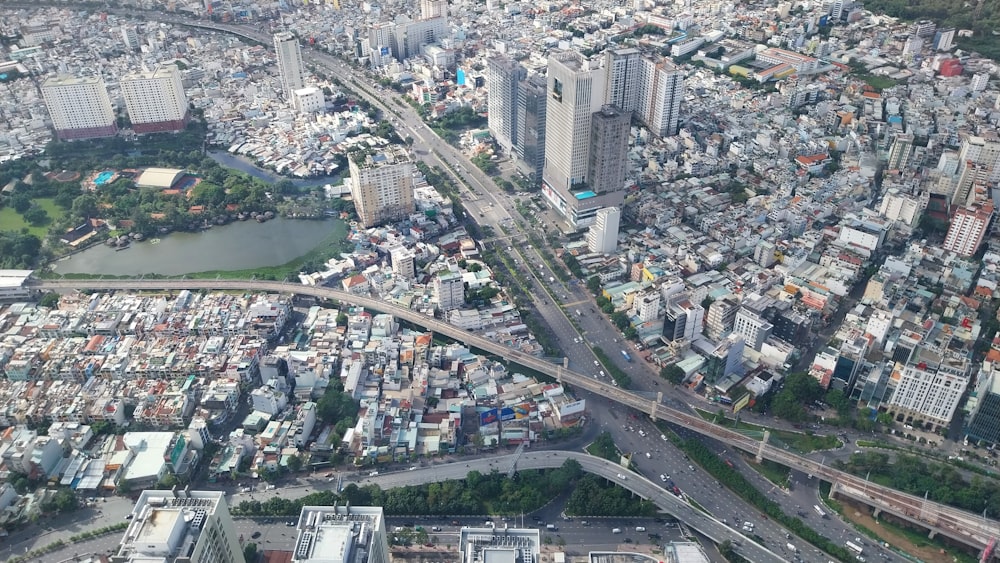 an aerial view of a city with lots of tall buildings