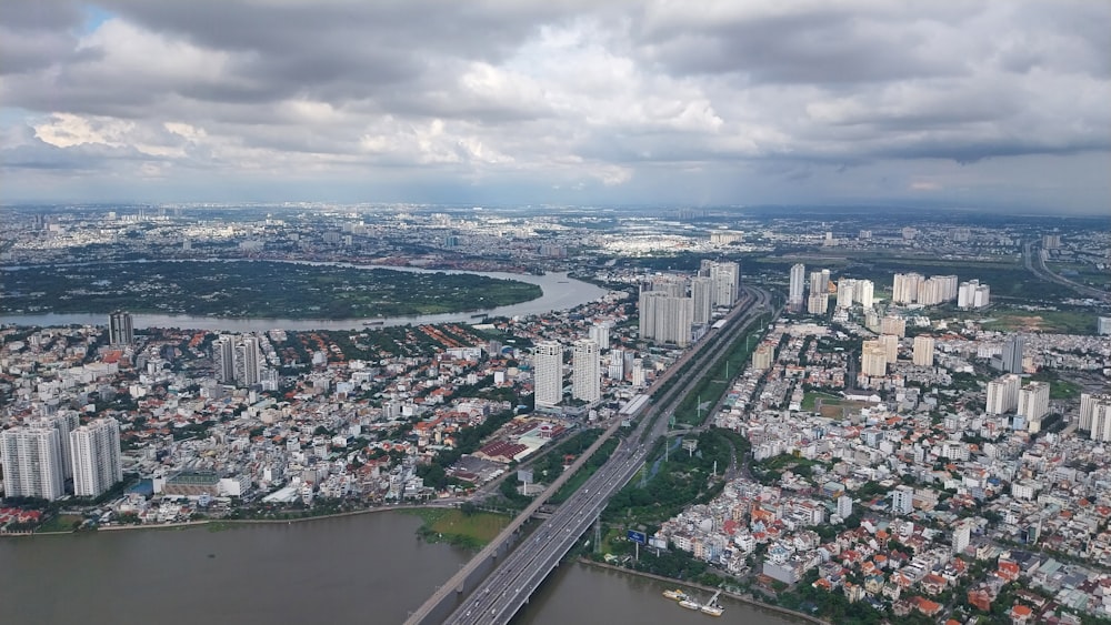 an aerial view of a city and a river