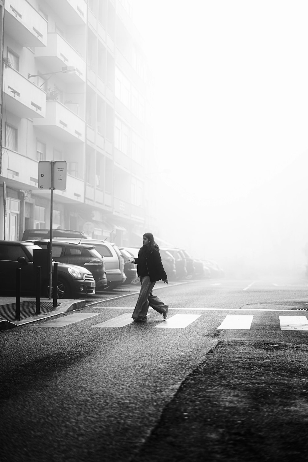 a person riding a skateboard on a city street