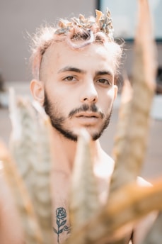 a man with a beard and a crown on his head