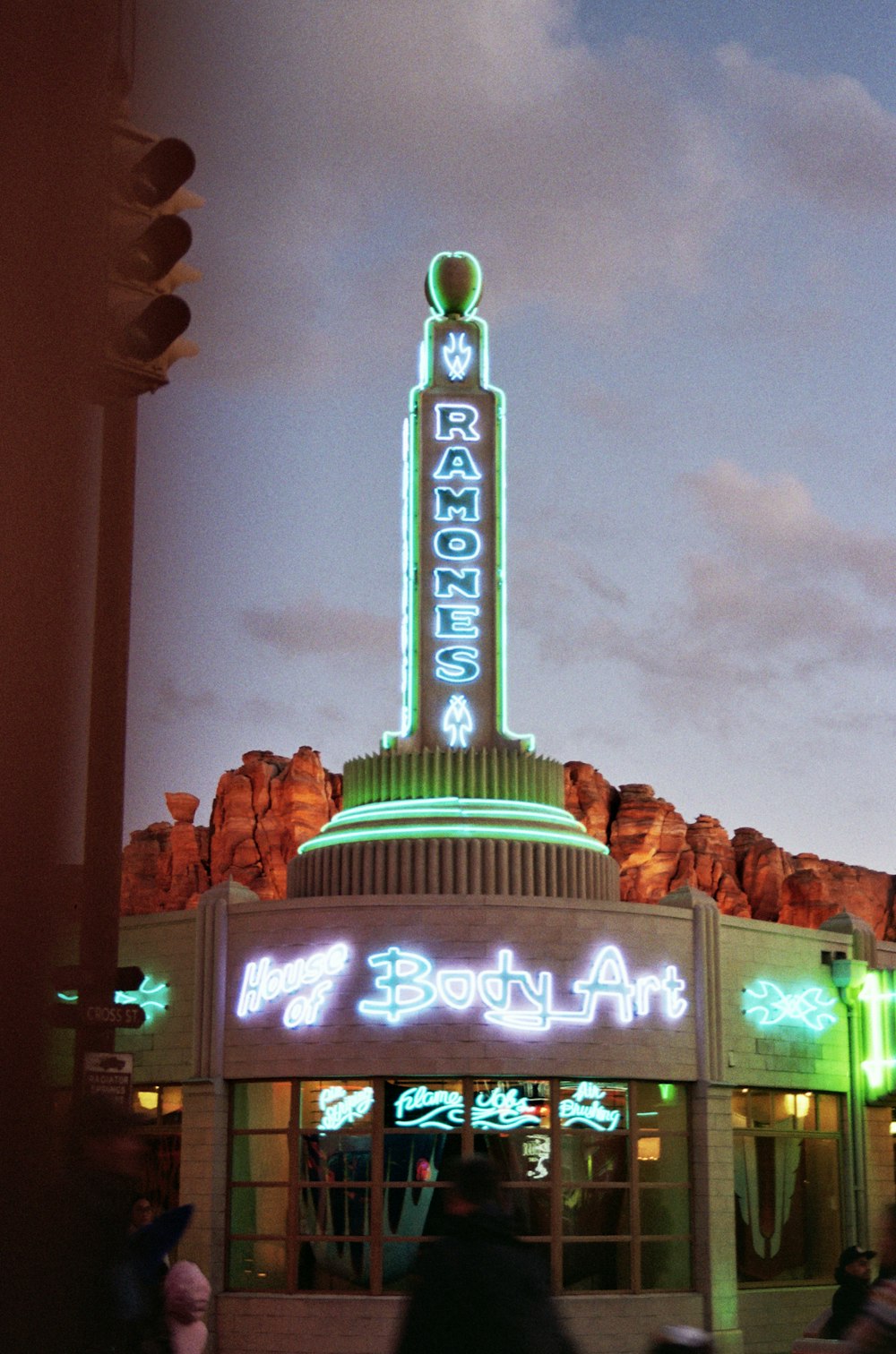 a neon sign on the side of a building