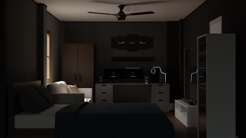 a dimly lit bedroom with a bed and a ceiling fan