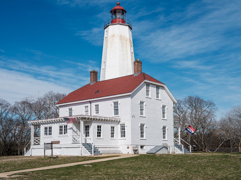 a large white building with a red roof