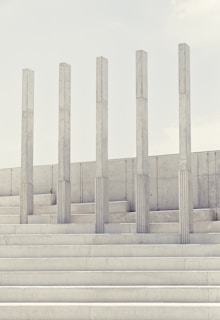 a man riding a skateboard down a set of stairs