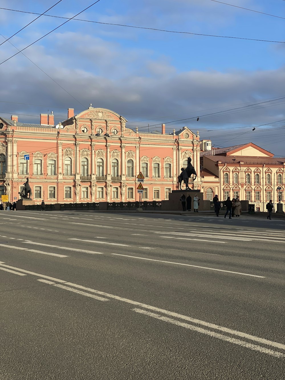 a large building sitting on the side of a road