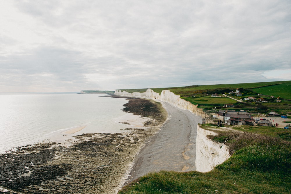 a view of a beach from a cliff