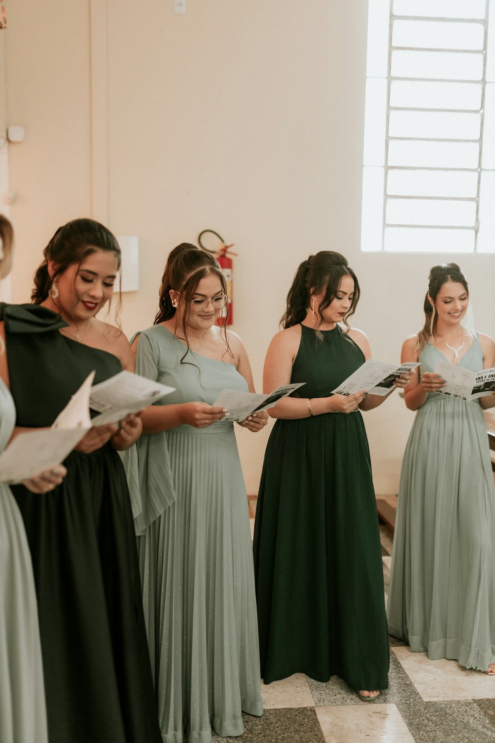 a group of women standing next to each other