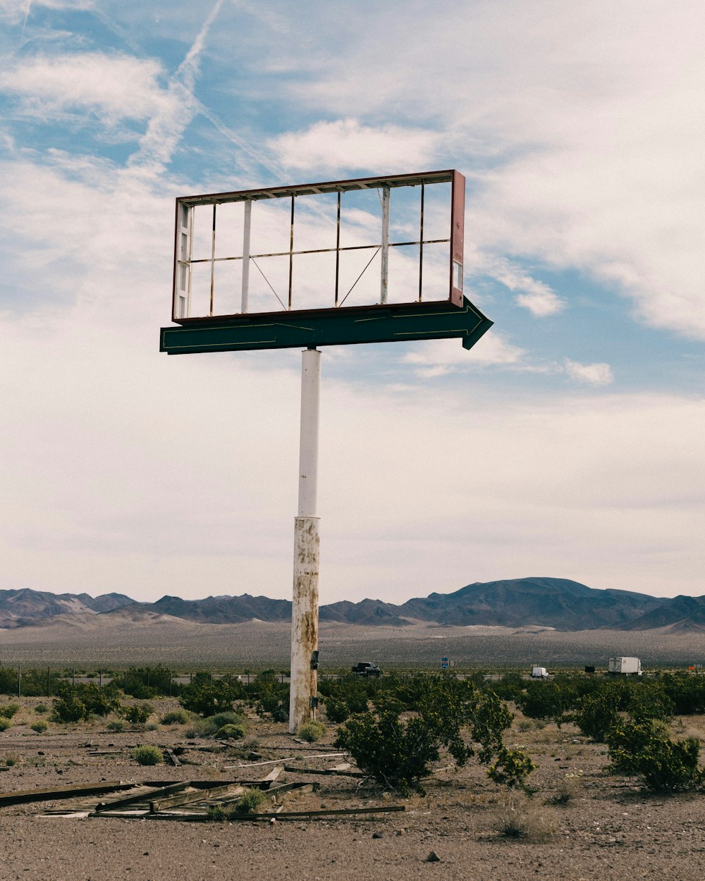 a tall white pole with a window on top of it