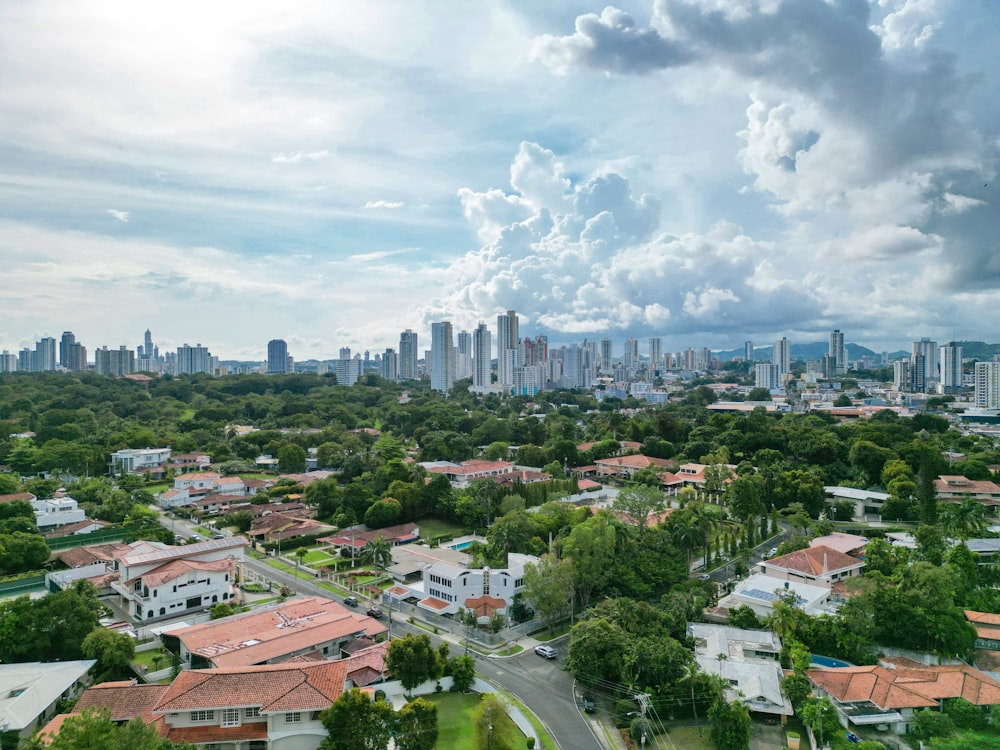 an aerial view of a city with tall buildings