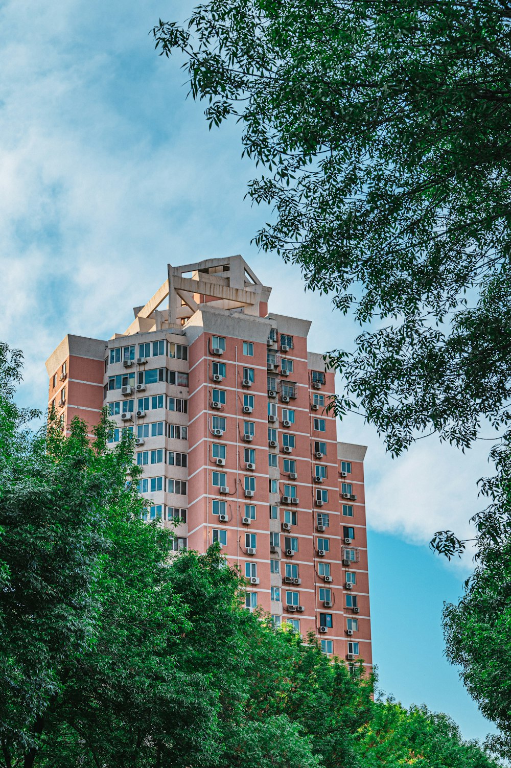 a tall brick building with lots of windows