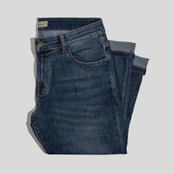 a pair of jeans sitting on top of each other