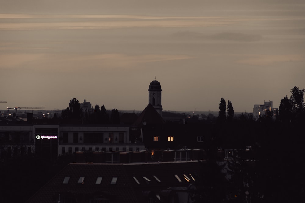 a view of a city with a clock tower