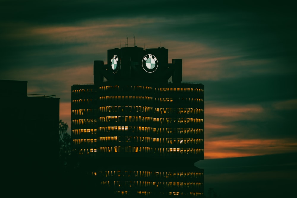 a tall building with a clock on the top of it