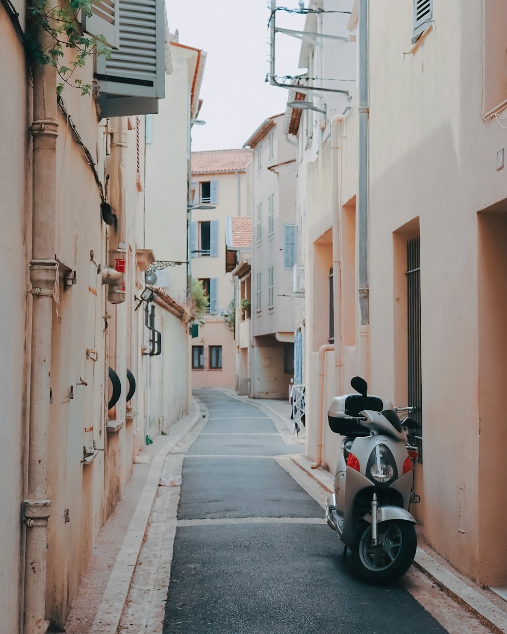 a motorcycle parked on the side of a street