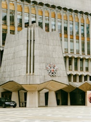 a large building with a clock on the side of it