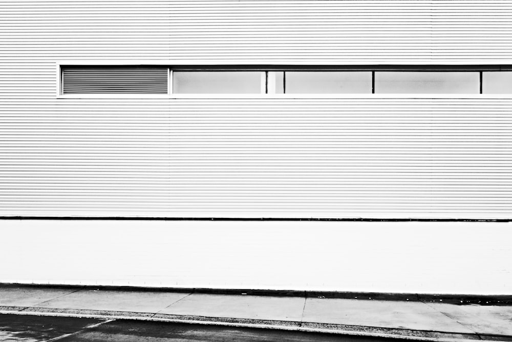 a black and white photo of a garage door